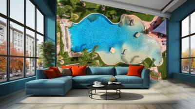 Original decorative pool in the garden with palm trees, aerial view. Wall mural