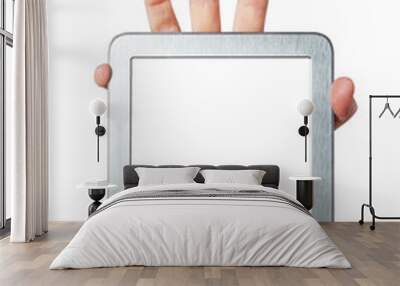 Tablet with a clean screen in the palm of your hand on a white b Wall mural