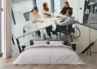 A group of business people partners during a set team meeting in the modern office. Teamwork concept Wall mural