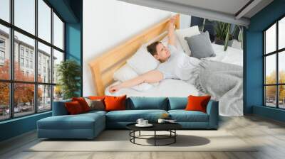 Attractive Middle Aged Woman Waking Up In Bed. Wall mural