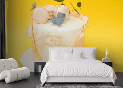 Cake on birthday on a yellow background. Wall mural