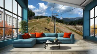 Chairlift ski lift in Bukovel Carpathians mountains Ukraine cableway extreme sport recreation concept cable car horizontal Wall mural