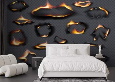 Collection of burnt faded holes piece burned paper realistic fire flame. Black paper burn in vintage style on transparent background. Wall mural