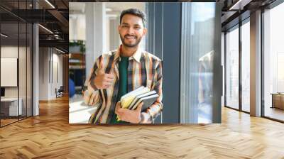 Happy indian male student at the university Wall mural