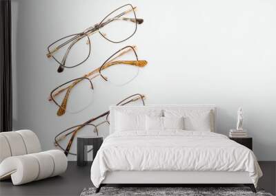 isolation glasses on white background. black and white combination oval eyeglass frames. oval eye glasses frame in the photo from above on a white background Wall mural