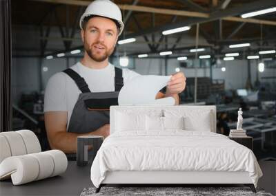 Male worker at a factory Wall mural