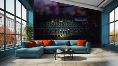 Front view to the working mixing console, an electronic device for changing the volume level, timbre (tone color) of many different audio signals Wall mural