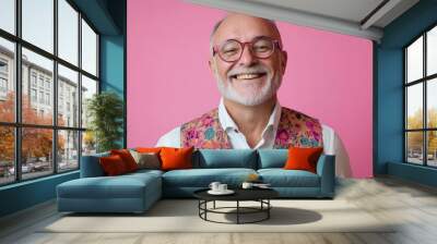 Older Gay Man. Portrait of a Smiling Mature Man in Vest and Glasses on Pink Background Wall mural