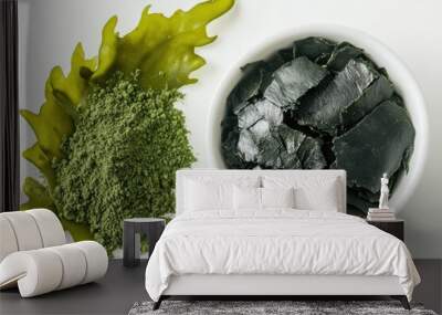 Seaweed Powder. Top View of Fresh Kelp and Spirulina Powder in White Bowl with Leafy Seaweed Background Wall mural