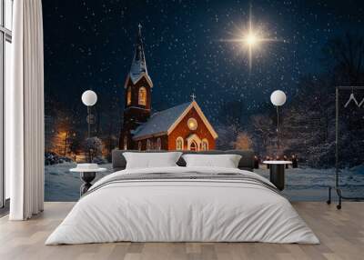 Snowy winter night at a quaint church with lights Wall mural