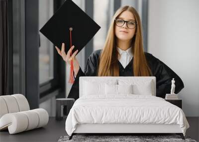 Woman portrait on her graduation day. University. Education, graduation and people concept. Wall mural