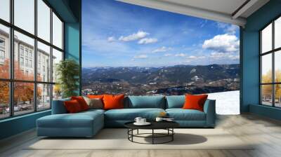 wonderful snowy mountain landscape in early spring Wall mural