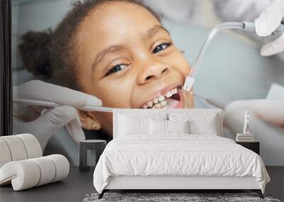 Cute african girl during dental treatment at modern clinic Wall mural