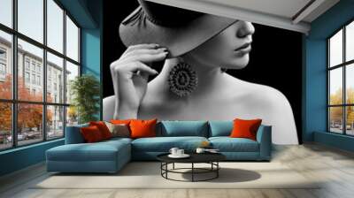 Portrait of beautiful sexy girl in black and white hat Wall mural