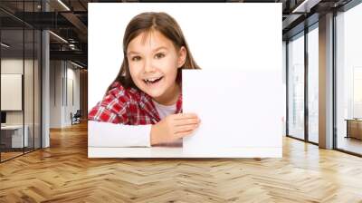 Little girl is looking from out blank board Wall mural