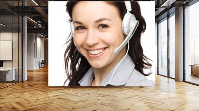 Lovely young woman is talking to customers Wall mural