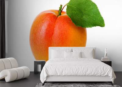 Ripe apricot fruit with green leaf isolate on white Wall mural