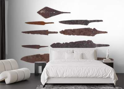 ancient rusty arrowhead isolated on white background Wall mural