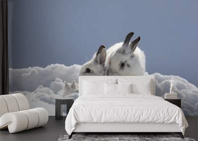 rabbit family, cute white rabbits in the snow Wall mural