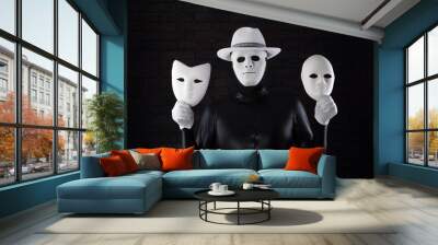 two-faced man in a white mask on a black background Wall mural