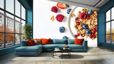 A top-down perspective emphasizing the vibrant colors and textures of a yogurt and granola breakfast with raspberries, blueberries, and strawberries. Generated Ai Wall mural