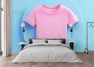 This bright pink t shirt is showcased on a circular blue platform, highlighting its smooth texture and vibrant color, perfect for summer wear. The refreshing color contrast draws attention to casual f Wall mural