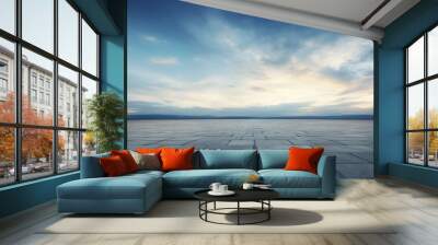 The horizon and the cloudy sky as a background, in the foreground an empty square. AI generated. Wall mural