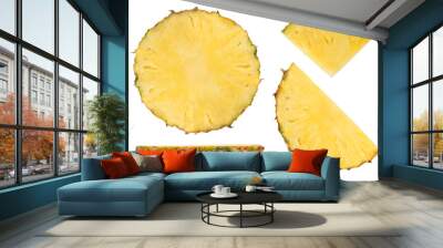 Pieces of ripe pineapple on a white isolated background. Pieces and slices of pineapple with a peel of different cutting methods from different sides. Isolate pieces of pineapple. Wall mural