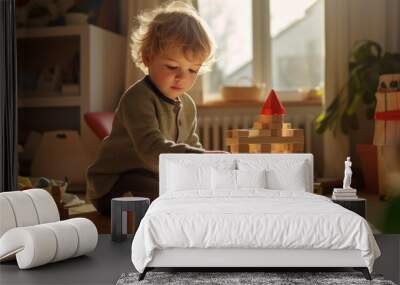 Young child playing with wooden toys blocks at home Wall mural