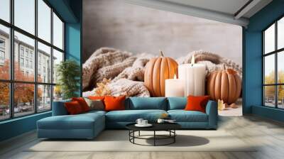 Autumn table decoration. Interior decor for fall holidays with handmade pumpkins and candles. Holiday greeting card, generative ai Wall mural