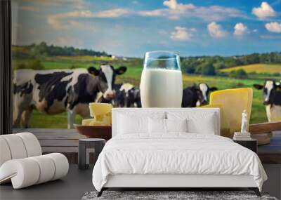 A farm with Holstein cows. Image material with milk, cheese, banner dairy products lined up. Wall mural