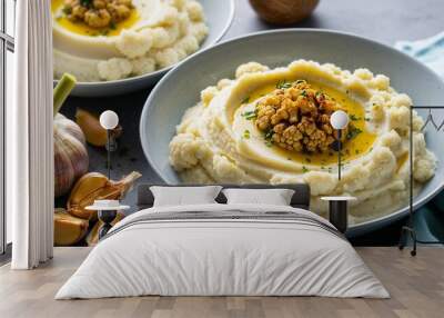 Cauliflower mash with roasted garlic closeup Wall mural