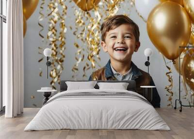 kid boy with gold balloons and confetti happy smiling on party concept background Wall mural