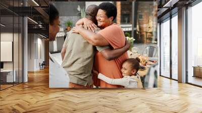 Waist up portrait of mature African-American woman embracing friend during family gathering at dinner party outdoors, copy space Wall mural