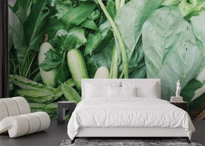 Fresh green vegetables in basket, support local famer, share produce community, sustainable living, vegan plant based healthy diet concept Wall mural