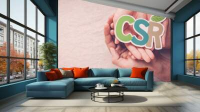 Hands holding CSR corporate social responsibility, responsible business concept Wall mural