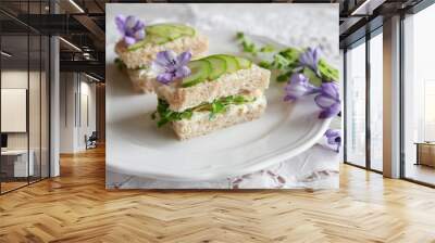 Homemade chicken cucumber cream cheese sandwiches with purple flo Wall mural