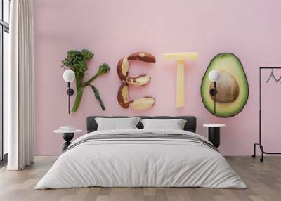 Keto word made from Ketogenic diet, low carb, healthy food on pink pastel background, new year health resolution Wall mural