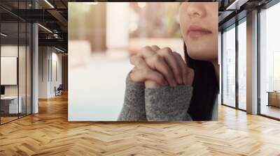 Young woman praying, Easter background Wall mural