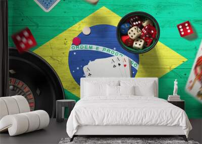 Brazil casino theme. Aces in poker game, cards and chips on red table with national flag background. Gambling and betting. Wall mural