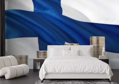 Finland flag waving in the background with rows of coins for finance and business concept. Saving money. Wall mural