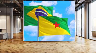 French Polynesia and Brazil national flag waving in the windy deep blue sky. Diplomacy and international relations concept. Wall mural