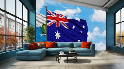 San Marino and Australia flag waving in the wind against white cloudy blue sky together. Diplomacy concept, international relations. Wall mural