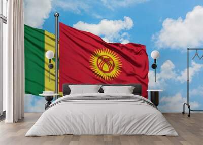 Senegal and Kyrgyzstan flag waving in the wind against white cloudy blue sky together. Diplomacy concept, international relations. Wall mural