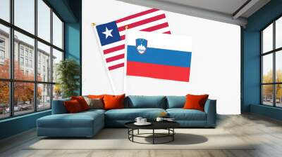 Slovenia and Liberia stick flags on white background. High quality fabric, miniature national flag. Peaceful global concept.White floor for copy space. Wall mural