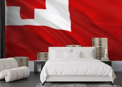 Tonga flag waving in the background with rows of coins for finance and business concept. Saving money. Wall mural