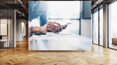 Business process photo. Account manager using mobile phone. Typing contemporary smartphone screen. Horizontal. Film effect. Blurred background Wall mural