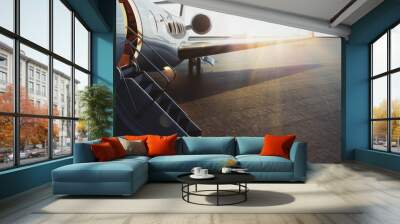 Closeup view of business jet airplane parked at outside and waiting vip persons. Luxury tourism and business travel transportation concept. Flares. 3d rendering Wall mural