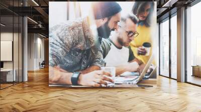 Group Young Business People Gathered Together Discussing Creative Idea Cafe.Startup Concept Coworkers Meeting.Brainstorming Work Process Office.Using Modern Electronics Gadgets.Blurred Background. Wall mural