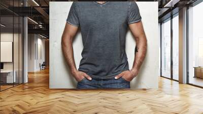 Man wearing blank grey t-shirt Wall mural